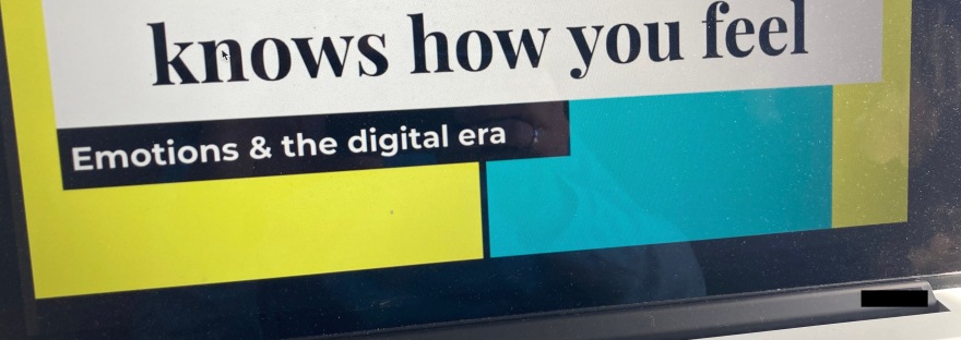 Computer showing presentation "Your smartphone knows how you feel"